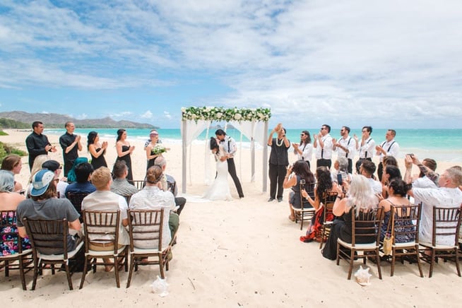 Wedding arbor and chairs for ceremony at Sherwood Forest Beach wedding on Oahu