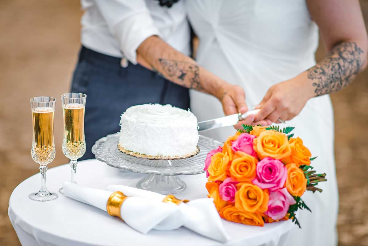 Cake Cutting Ceremony at beach wedding in Hawaii
