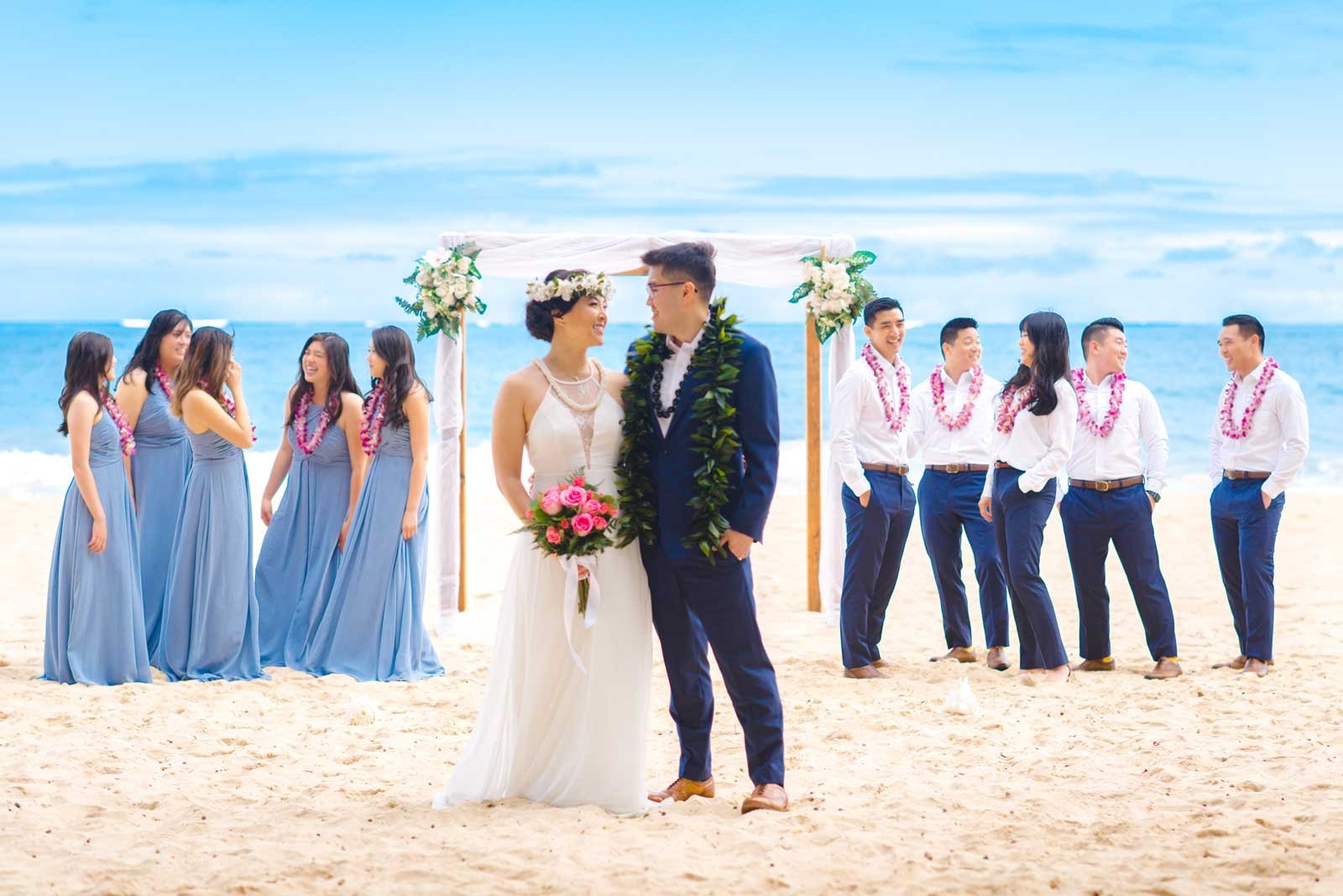 Small wedding with bridal party at beach wedding in Hawaii