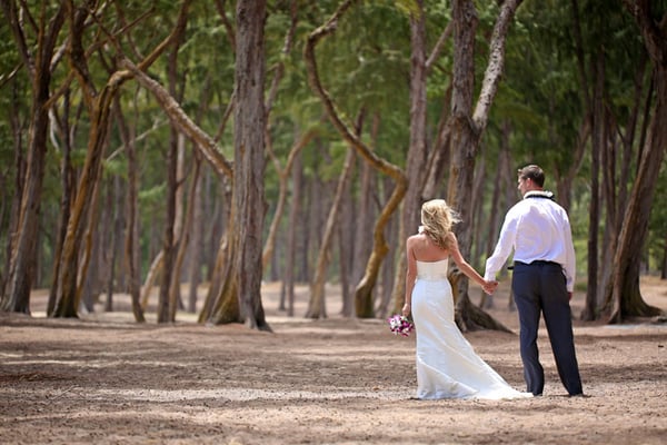 Newlyweds after their Hawaii wedding at Sherwood Beach