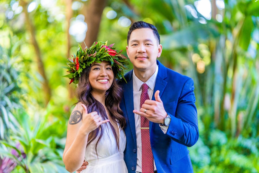 Elopement couple posing for a photo at their wedding