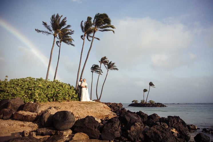 Hawaii beach wedding with rainbow at Waialae