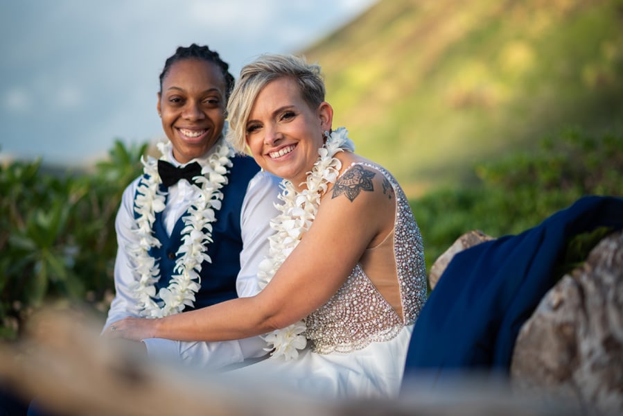 Newlyweds at their elopement on a beach in Hawaii