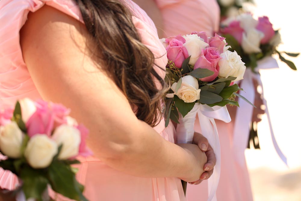Pink and ivory bridesmaids bouquets to compliment bridal bouqet